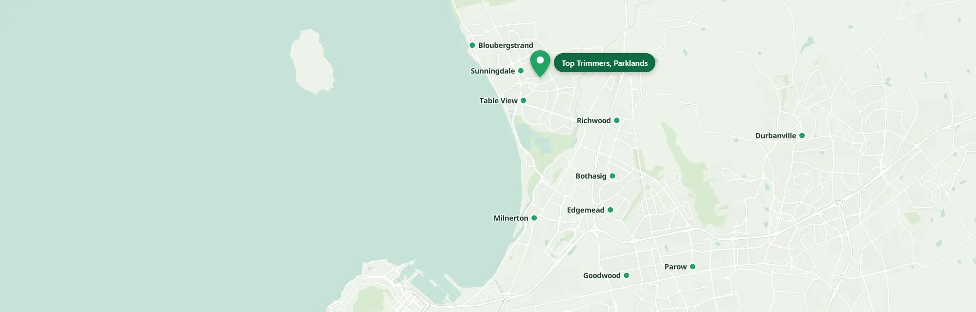 Map of Cape Town's northern suburbs with a green pin on Parklands, where Top Trimmers is based, and a green dot on each suburb they work in: Bloubergstrand, Sunningdale, Table View, Richwood, Bothasig, Edgemead, Milnerton, Goodwood, Parow and Durbanville